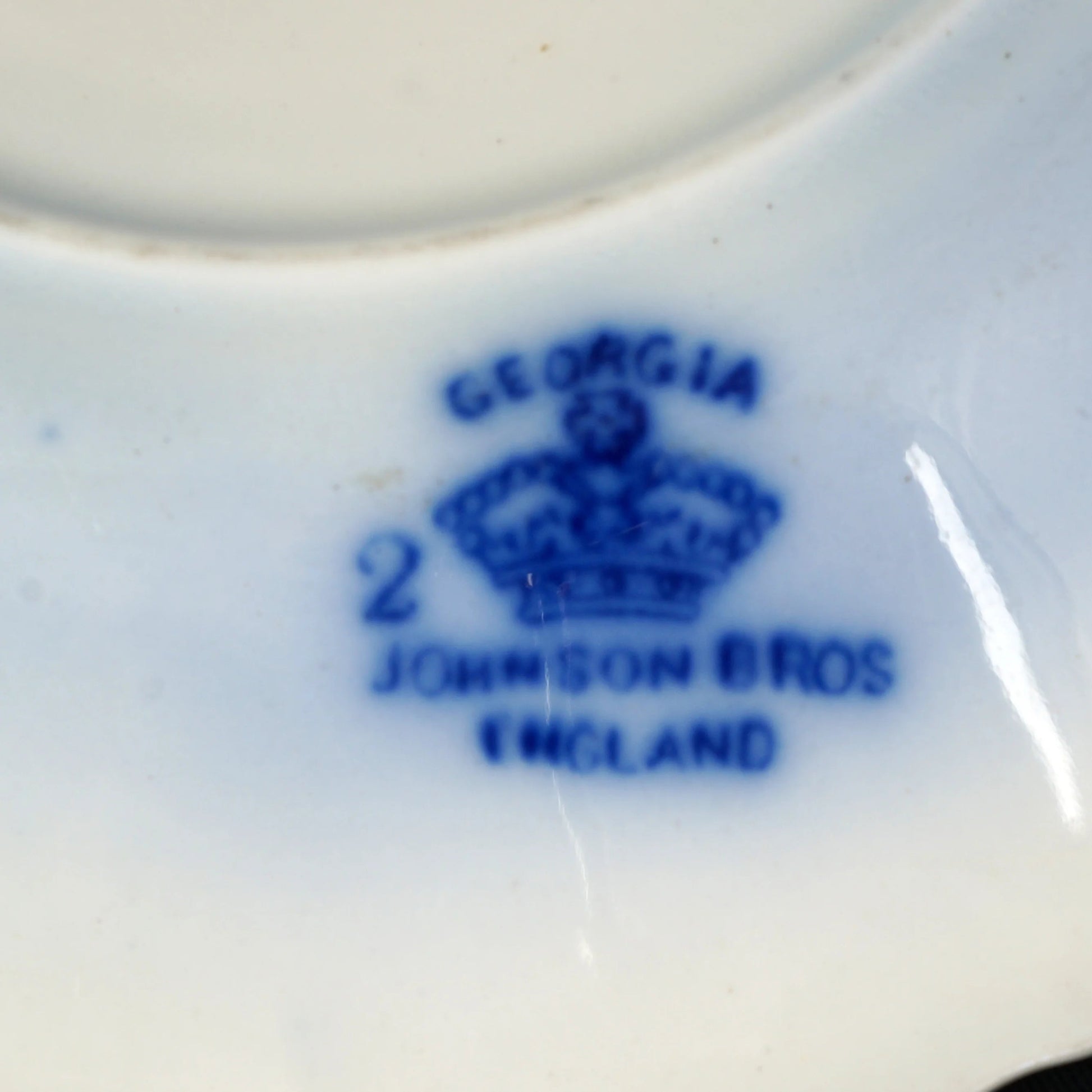 Antique English Flow Blue Teacup and Saucer Johnson Bros Georgia - Bear and Raven Antiques