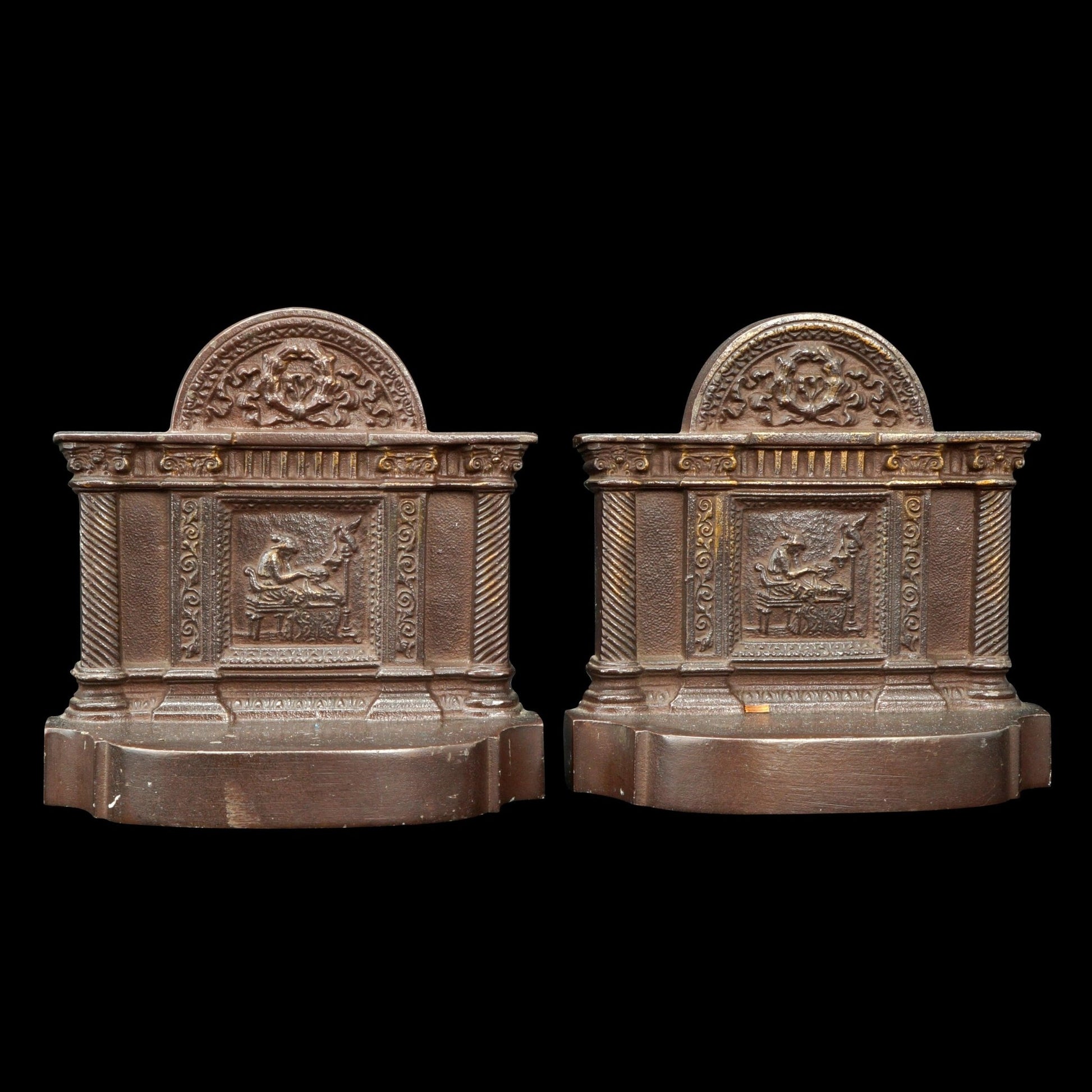 Pair of Bradley and Hubbard Iron Bookends with Spinning Scene Circa 1930 - Bear and Raven Antiques