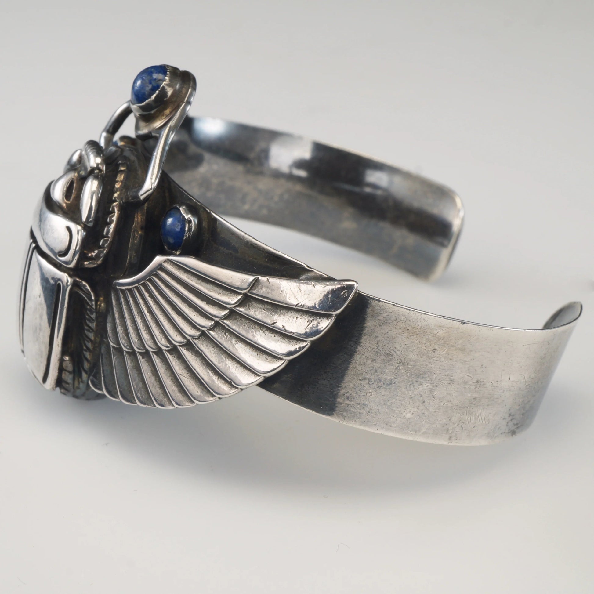 Vintage Egyptian Revival Winged Scarab Unisex 800 Silver Cuff Bracelet 1977 - Bear and Raven Antiques
