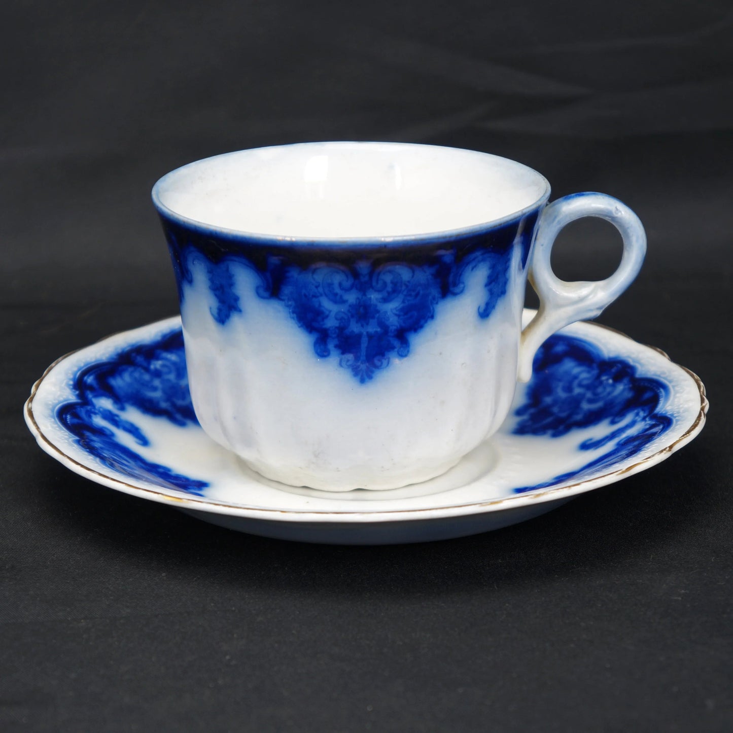 Antique English Flow Blue Teacup and Saucer Johnson Bros Georgia - Bear and Raven Antiques