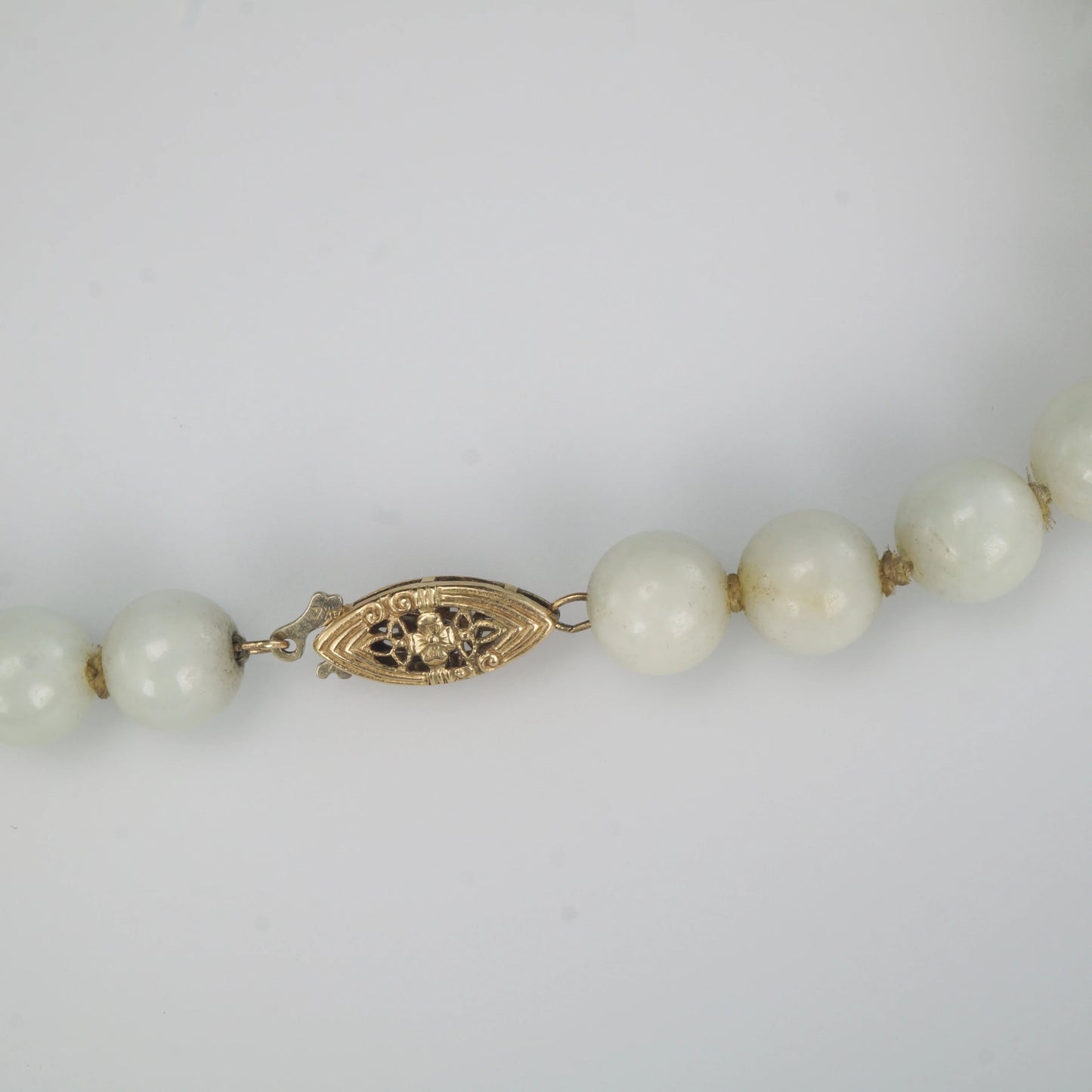 Chinese Republic Era Pale Grey Green Jade Hand - knotted Bead Necklace with 14K Gold Clasp - Bear and Raven Antiques