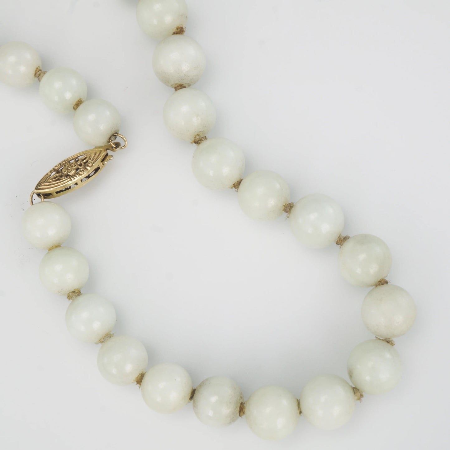 Chinese Republic Era Pale Grey Green Jade Hand - knotted Bead Necklace with 14K Gold Clasp - Bear and Raven Antiques