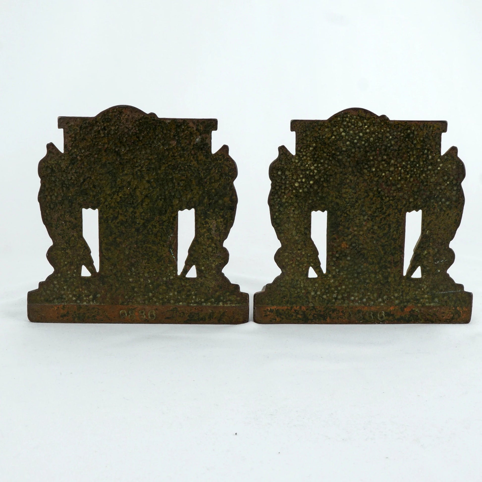 Pair of Lamp of Knowledge Bookends Cast Iron Judd 1926 - Bear and Raven Antiques