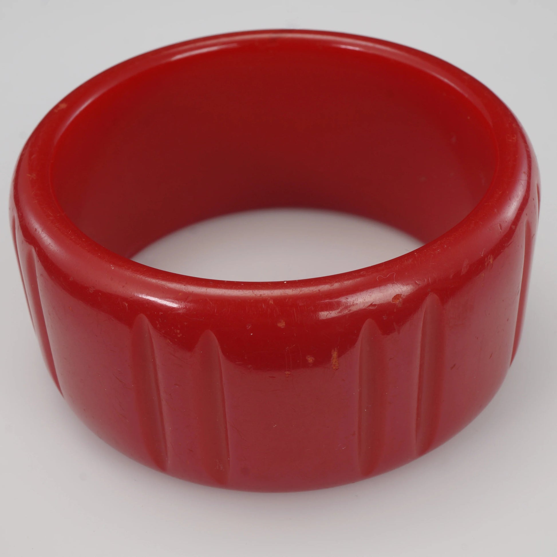 Vintage Bakelite Cherry Red Carved Wide Bangle 1940’s - Bear and Raven Antiques