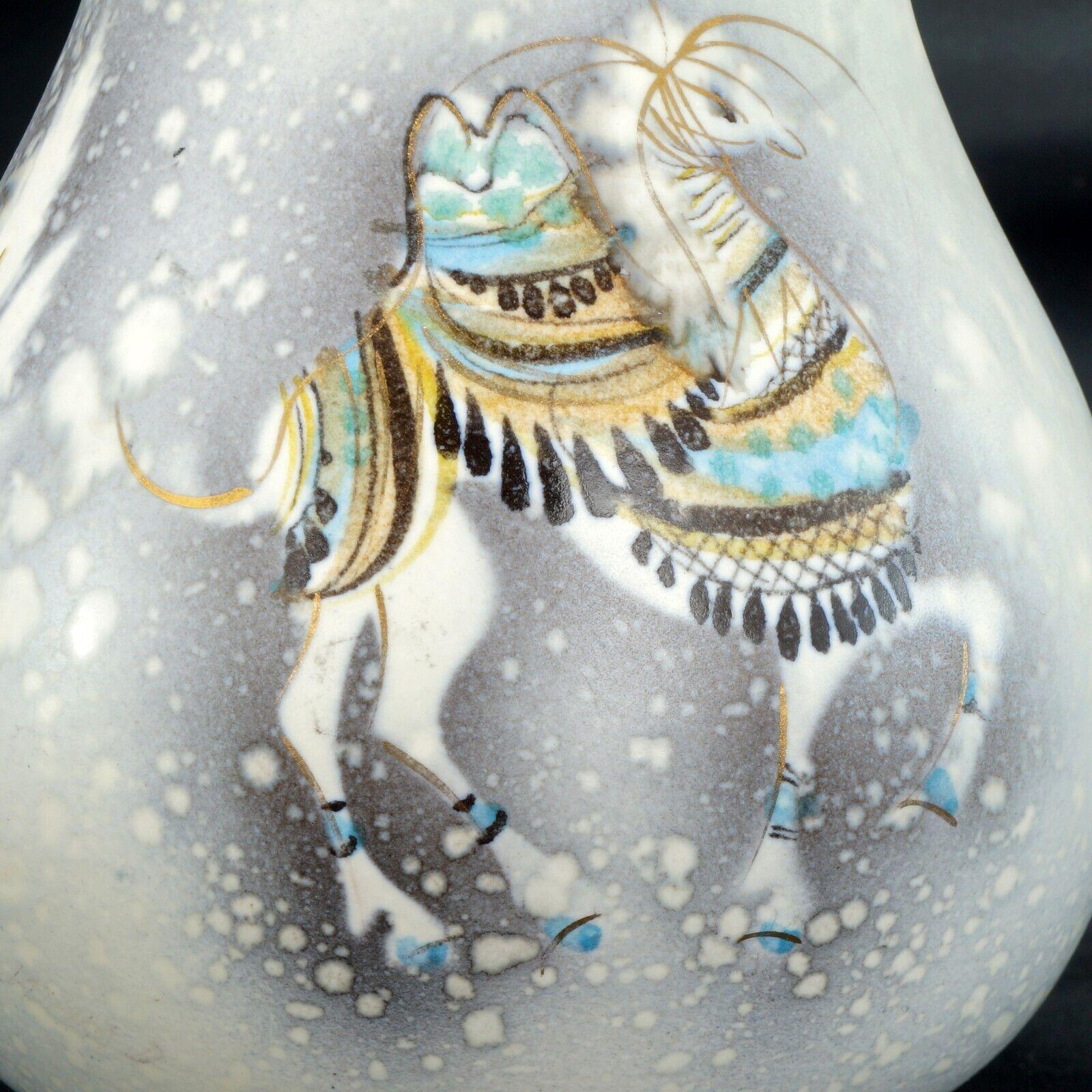 https://bearandraven.com/cdn/shop/products/mid-century-sascha-brastoff-pitcher-hand-painted-with-decorated-camels-1950s-200774.jpg?v=1669254696&width=1946