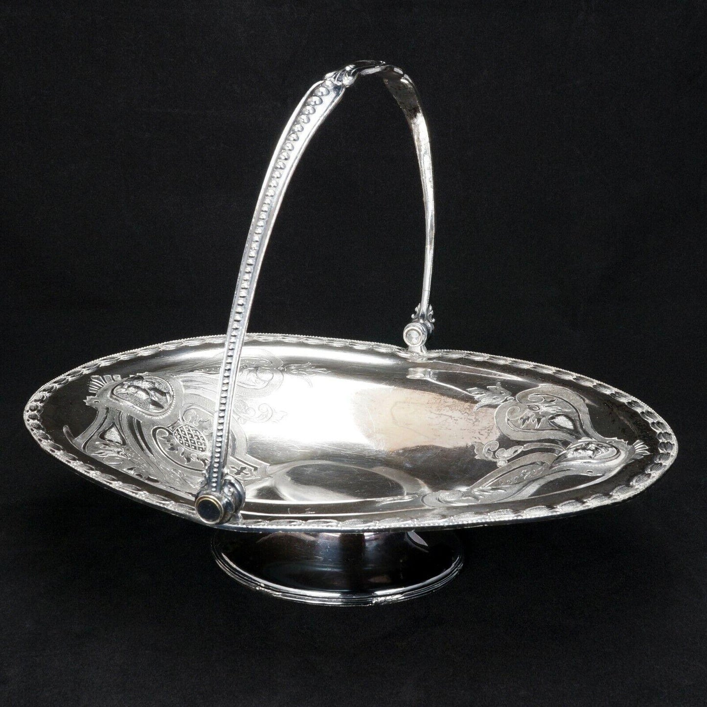 Victorian Renaissance Revival Meriden Silver Plate Cake Basket circa 1860 - Bear and Raven Antiques