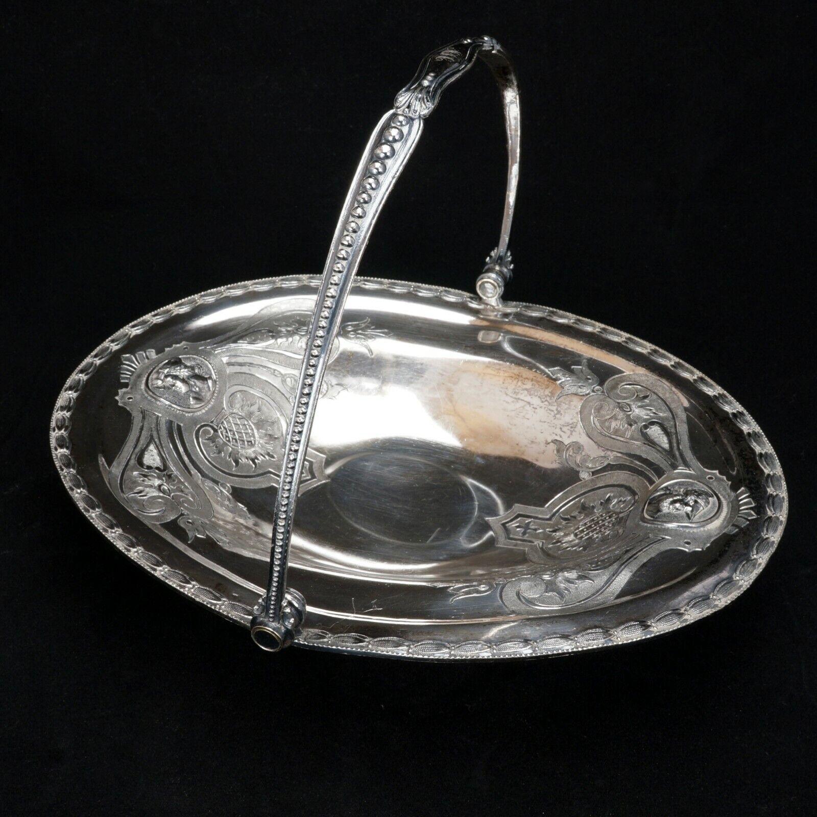 Victorian Renaissance Revival Meriden Silver Plate Cake Basket circa 1860 - Bear and Raven Antiques